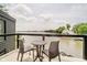 Balcony overlooking waterfront views with seating area at 121 Wesley Cir, Noblesville, IN 46062