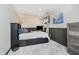 Cozy bedroom featuring wood paneling, stylish decor, and ample storage at 121 Wesley Cir, Noblesville, IN 46062