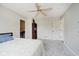 Large bedroom with a ceiling fan, a doorway, and carpet flooring at 121 Wesley Cir, Noblesville, IN 46062