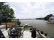 Enjoy lake views from this deck featuring an outdoor dining area and room to grill at 121 Wesley Cir, Noblesville, IN 46062