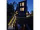 This home has exterior lighting to highlight the home and lake access at 121 Wesley Cir, Noblesville, IN 46062