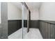Hallway features carpeted floor, wainscoting, and a mirror sliding door closet at 121 Wesley Cir, Noblesville, IN 46062
