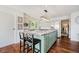 Spacious kitchen with stainless steel appliances, a large island and barstool seating at 121 Wesley Cir, Noblesville, IN 46062
