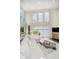 Sun-filled living room featuring soaring ceilings, large windows, and stylish furnishings at 121 Wesley Cir, Noblesville, IN 46062