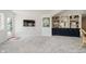 Open living area featuring a built-in bar and easy outdoor access at 121 Wesley Cir, Noblesville, IN 46062