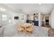Living room features a dining area with built-in bar and shelving at 121 Wesley Cir, Noblesville, IN 46062