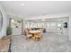 Open living area with a dining table and views of the water at 121 Wesley Cir, Noblesville, IN 46062