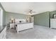 Large main bedroom with neutral tones, a ceiling fan, and ample closet space at 121 Wesley Cir, Noblesville, IN 46062