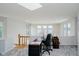 Bright office space with desk and lake views from multiple windows at 121 Wesley Cir, Noblesville, IN 46062