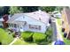 Aerial view of a home featuring a well-maintained yard and a classic roof at 1227 W 9Th St, Anderson, IN 46016
