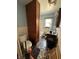 Functional bathroom with tiled floor, storage, and natural light, ready for personalization at 1227 W 9Th St, Anderson, IN 46016