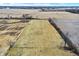 Vast open land highlighting the property's size, borders defined by trees, and fields ready for cultivation or development at 12471 N 100 E, Alexandria, IN 46001