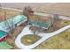 Aerial perspective of property with long driveway and several outbuildings at 12471 N 100 E, Alexandria, IN 46001