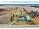 Aerial view of the property showcasing its layout and surrounding fields at 12471 N 100 E, Alexandria, IN 46001