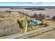 Aerial view of property with agricultural fields and multiple outbuildings at 12471 N 100 E, Alexandria, IN 46001