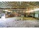 Barn interior featuring an exposed beam ceiling, bright lighting, animal pens and ample space at 12471 N 100 E, Alexandria, IN 46001
