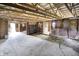 Multi-use barn interior with individual stalls and open areas, offering a blank canvas at 12471 N 100 E, Alexandria, IN 46001