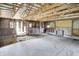 Open barn interior featuring a concrete floor and natural lighting, suitable for equipment storage at 12471 N 100 E, Alexandria, IN 46001