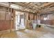Rustic barn interior with wooden beams and stalls, ideal for livestock or agricultural use at 12471 N 100 E, Alexandria, IN 46001