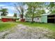 A charming property with a collection of barns, complemented by a well-maintained gravel driveway at 12471 N 100 E, Alexandria, IN 46001