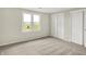 Bedroom featuring carpet, window and closets at 12471 N 100 E, Alexandria, IN 46001