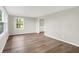 Bright, airy room with hardwood floors and access to an adjacent room, creating an open and spacious feel at 12471 N 100 E, Alexandria, IN 46001