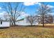 Spacious backyard featuring an outbuilding, and mature trees at 12471 N 100 E, Alexandria, IN 46001