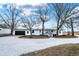 View of house with attached garage and extended driveway at 12471 N 100 E, Alexandria, IN 46001