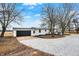 View of house with attached garage and extended driveway at 12471 N 100 E, Alexandria, IN 46001