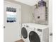 Clean laundry room with modern washer and dryer at 12471 N 100 E, Alexandria, IN 46001