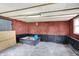 A room with a concrete floor, wood paneling and black trim at 12471 N 100 E, Alexandria, IN 46001