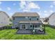 Backyard featuring dark wooden deck with pergola, ample seating and fenced in yard at 1306 Avocet Dr, Greenwood, IN 46143
