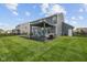 Backyard showcasing the deck and pergola of a two-story home at 1306 Avocet Dr, Greenwood, IN 46143