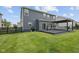 Large backyard with deck and pergola, perfect for outdoor entertaining at 1306 Avocet Dr, Greenwood, IN 46143