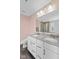 Bathroom with a double sink vanity featuring granite countertops and a tiled shower at 1306 Avocet Dr, Greenwood, IN 46143