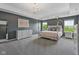 Spacious bedroom boasts tray ceilings, chandelier, and ample natural light at 1306 Avocet Dr, Greenwood, IN 46143