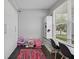 Bright flex room with storage, hardwood floors, modern decor, and natural light from window at 1306 Avocet Dr, Greenwood, IN 46143