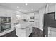 Modern kitchen featuring white cabinets, granite countertops, and stainless steel appliances at 1306 Avocet Dr, Greenwood, IN 46143