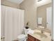 Neutral bathroom featuring a shower with curtain, classic sink, and white fixtures at 13191 Roma, Carmel, IN 46074