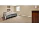 Comfortable bedroom with carpet and ample natural light, showcasing a cozy and inviting space at 13191 Roma, Carmel, IN 46074