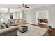 Living room with comfortable seating and access to a home office space at 13191 Roma, Carmel, IN 46074