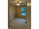 Cozy bedroom showcasing neutral carpet and window views, creating a relaxing atmosphere at 13262 Landwood Dr, Fishers, IN 46037