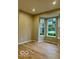 Living room with hardwood floors and many windows that let in natural light at 13262 Landwood Dr, Fishers, IN 46037