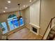 Beautiful living room with fireplace and pool view at 13262 Landwood Dr, Fishers, IN 46037