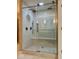 Walk in shower with glass door, rain shower head and built in bench at 13262 Landwood Dr, Fishers, IN 46037