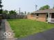 Well-maintained backyard with green grass and a privacy fence at 1333 S B St, Elwood, IN 46036