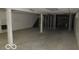 Unfinished basement with concrete floors and walls, offering potential for customization and additional living space at 1333 S B St, Elwood, IN 46036