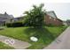 Exterior image of a well-kept brick house with tidy landscaping at 1333 S B St, Elwood, IN 46036