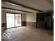 Bright living room with sliding glass doors to the backyard at 1333 S B St, Elwood, IN 46036