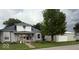 Charming two-story home with a covered front porch and a detached garage at 1352 S County Road 850 W, Greensburg, IN 47240